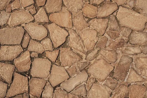 Fragment Van Een Muur Van Een Afgestoken Stenen Achtergrond — Stockfoto