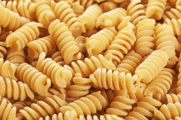 Pişmemiş Düdük makarna arka planı kapat