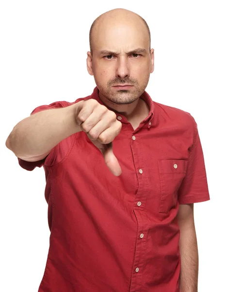愤怒的中年秃头男子露出大拇指 隔离在白色背景上 — 图库照片