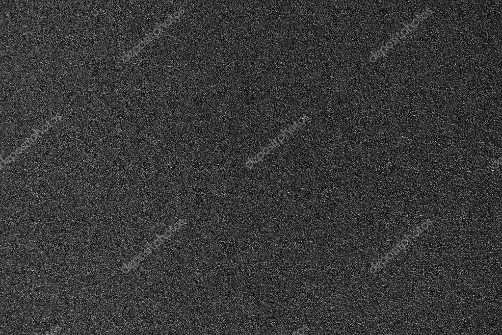 Smooth asphalt road background. Texture of the tarmac, top view.