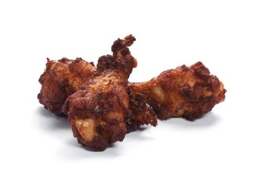 Kavrulmuş tavuk budu üzerinde beyaz izole. Fast food. Sağlıksız yeme