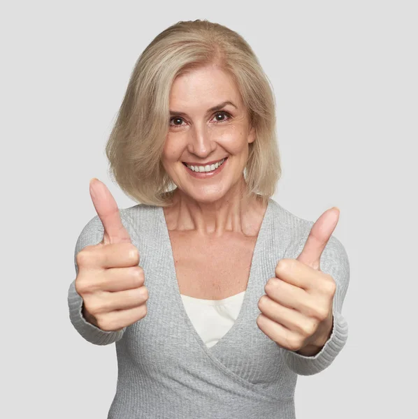 Excited Mature Woman Showing Thumbs Studio Portrait — Stock Photo, Image