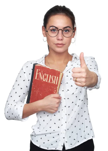 Menina bonita segurando um livro em inglês — Fotografia de Stock