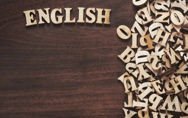 Engelskt ord gjort av trä bokstäver — Stockfoto
