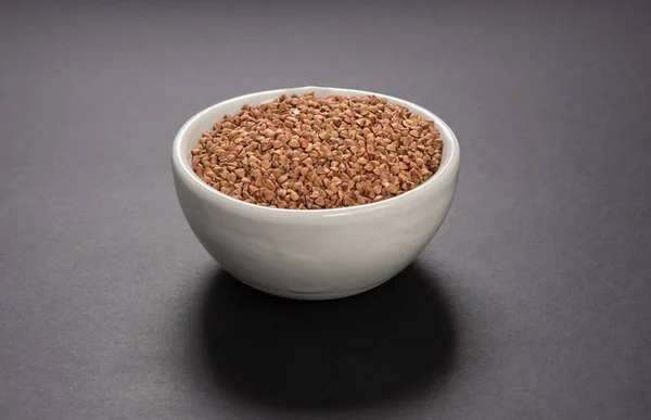 Portion of uncooked buckwheat for cooking — Stock Photo, Image