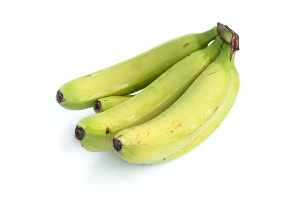 Bananas verdes em um fundo branco — Fotografia de Stock
