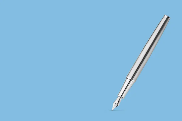 Silver metal fountain pen on blue background — Stock Photo, Image