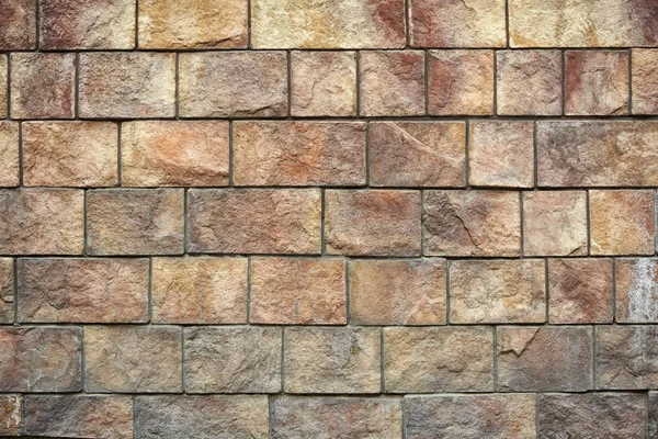 Natuursteen bakstenen muur textuur achtergrond — Stockfoto