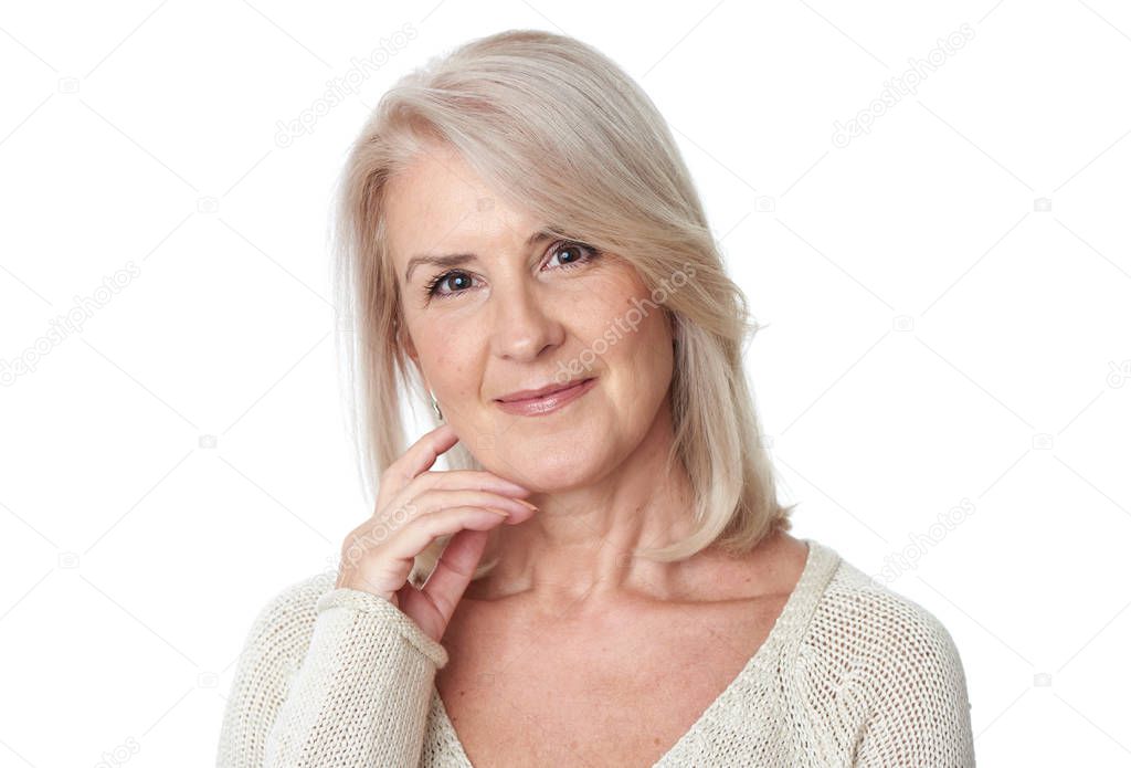 Beautiful 50 years old woman portrait isolated on white backgrou