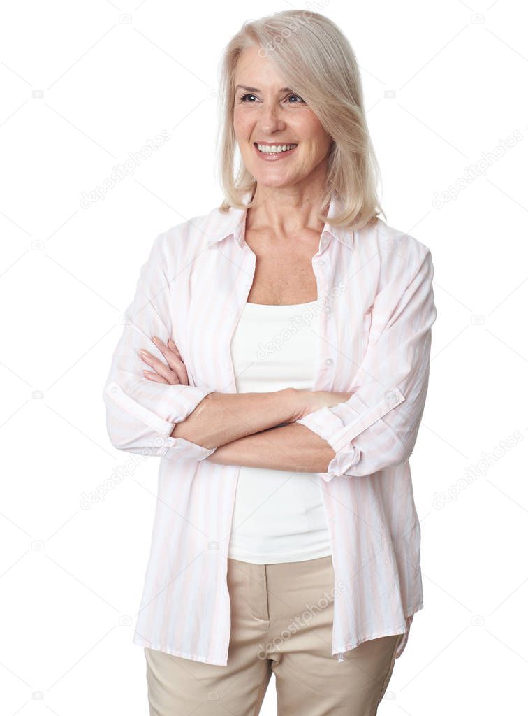 Cheerful senior woman with hands folded is looking away. Isolate