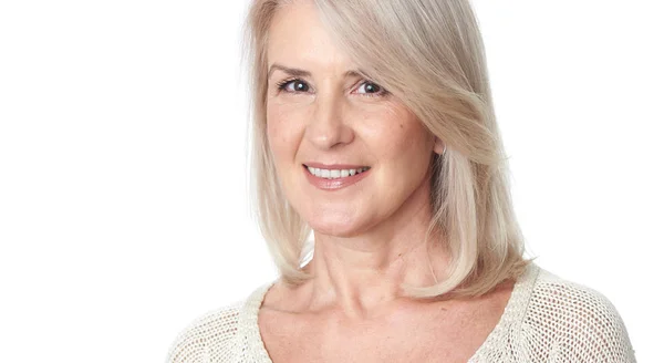 Portrait of happy aged woman over white background — Stock Photo, Image