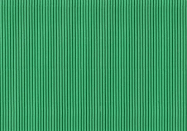 Corrugated colored cardboard green vintage color. Textural paper