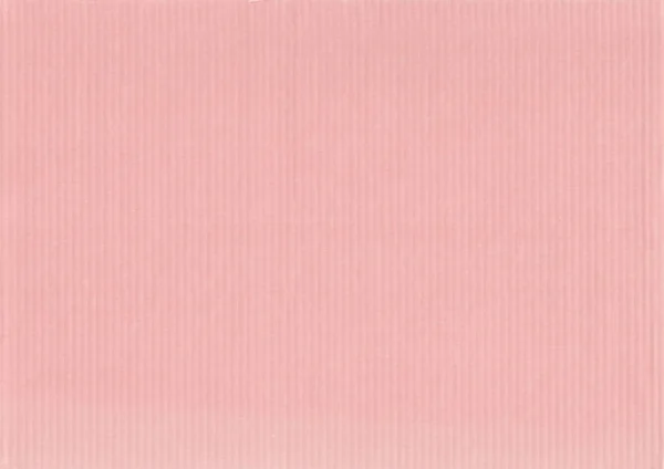 Corrugated colored cardboard pink vintage color. Textural paper