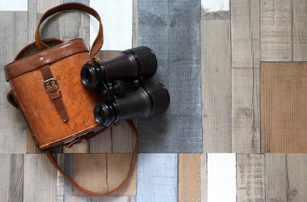 Old Binoculars Leather Case Color Wooden Background — Stock Photo, Image