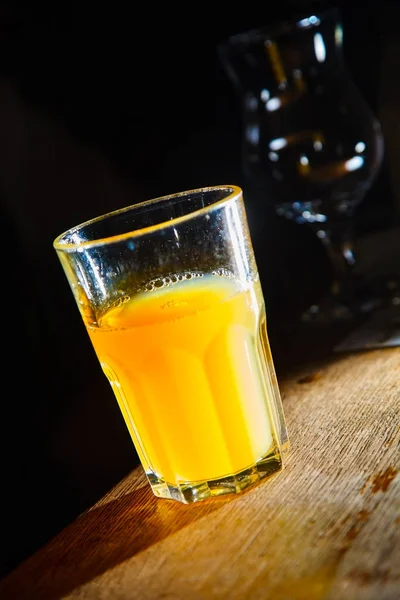 drink on bar. orange juice
