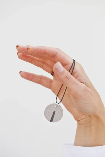 Woman Hand Holding Stylish Grey Beaded Necklace — Stock Photo, Image