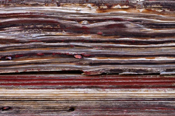 Antigua textura grunge puerta roja de madera — Foto de Stock