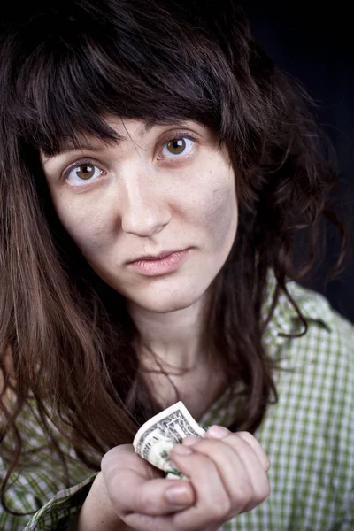 Begging young woman with some money iin her hands. — Stock Photo, Image