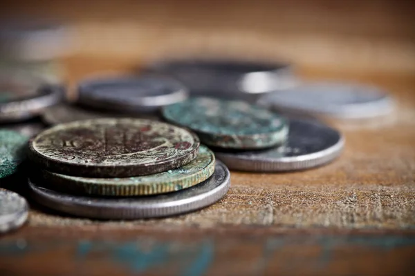 Pile of different ancient copper coins with patina.