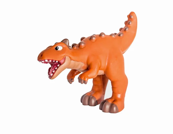 Mainan Dinosaurus Oranye Plastik Carnotaur Diisolasi Pada Latar Belakang Putih — Stok Foto