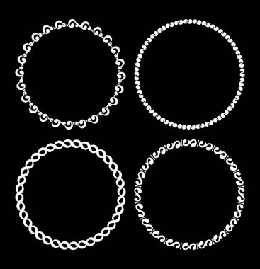 Siyah bir arka plan üzerinde olağandışı süsleme ile yuvarlak çerçeve kümesi