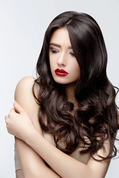 Brunette asian girl with long curly hair — Stock Photo, Image