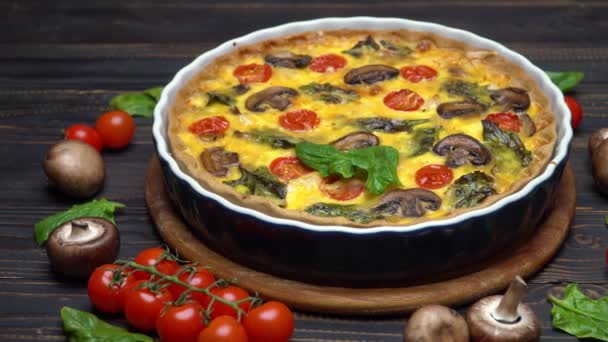 Traditional french Baked homemade quiche pie on wooden cutting board — Stock Video