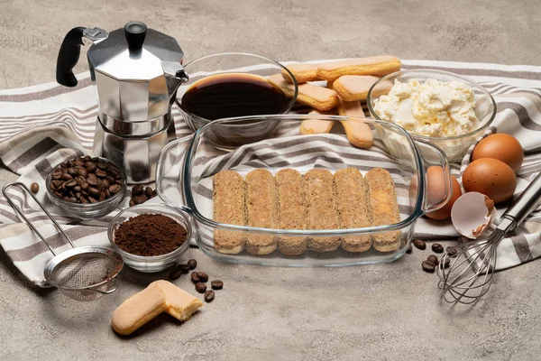 Ingredients for traditional tiramisu cake on concrete background — Stock Photo, Image