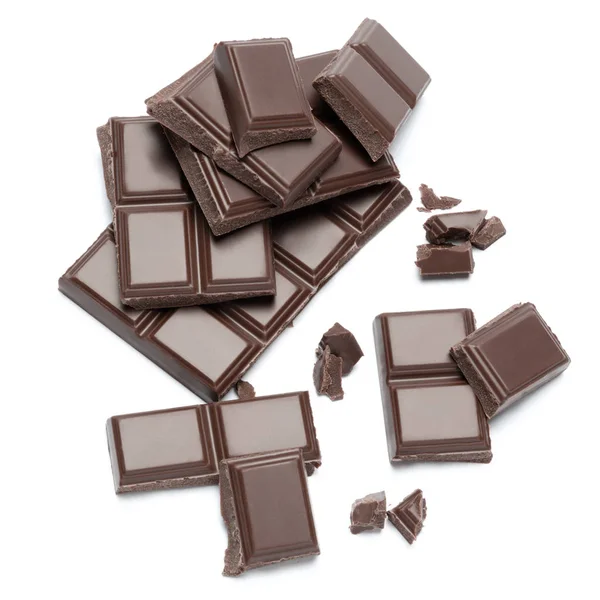 Dark organic chocolate pieces isolated on white background — Stock Photo, Image