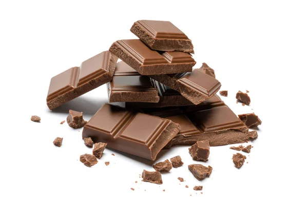 Milk organic chocolate pieces isolated on white background — Stock Photo, Image