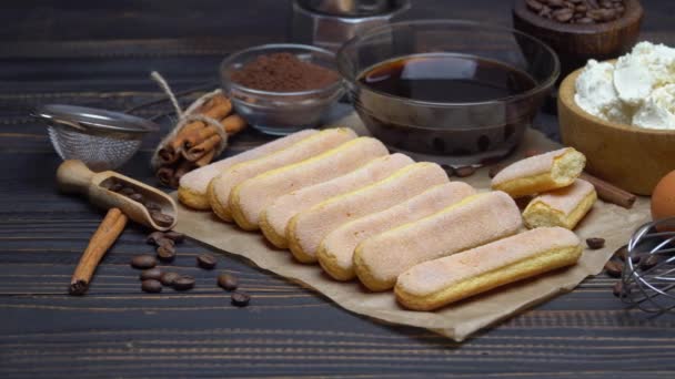 Tiramisu cake cooking - Savoiardi ladyfingers Biscuits, cheese and coffee — Stock Video