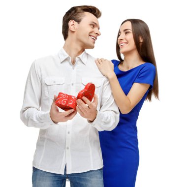 Happy young couple with Valentines Day present clipart