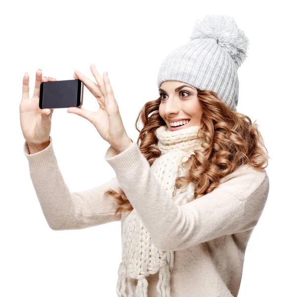 Beautiful young woman in knitted wool sweater smiling — Stock Photo, Image