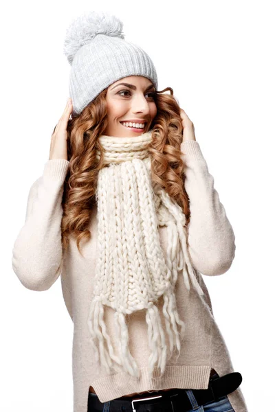 Beautiful young woman in knitted wool sweater smiling Stock Image