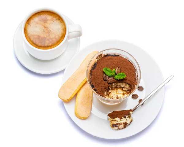 Classic tiramisu dessert in a glass cup, savoiardi cookies and coffee beans on white background with clipping path — Stock Photo, Image