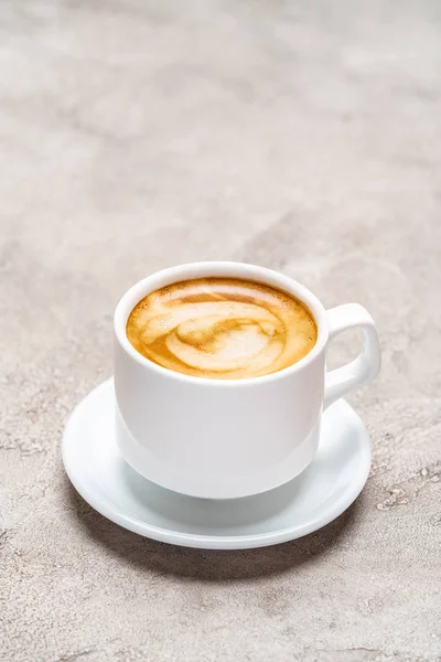 一杯浓缩咖啡在康雷特背景 — 图库照片