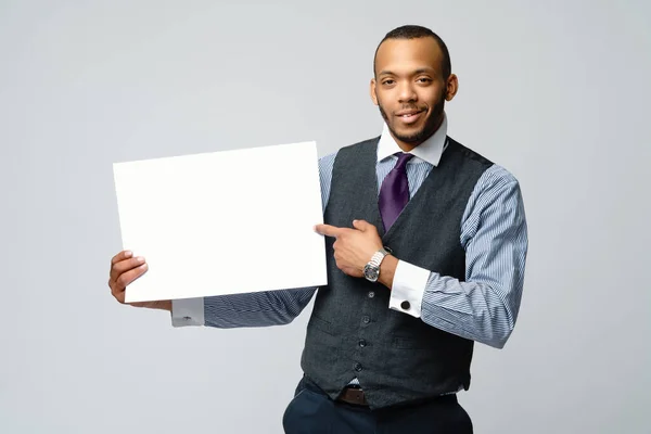 Professional african-american business man - presenting holding blank sign — Stock Photo, Image