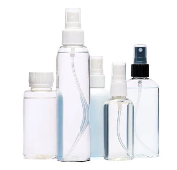 Grupo de manos desinfectante aerosol botellas aisladas sobre fondo blanco — Foto de Stock