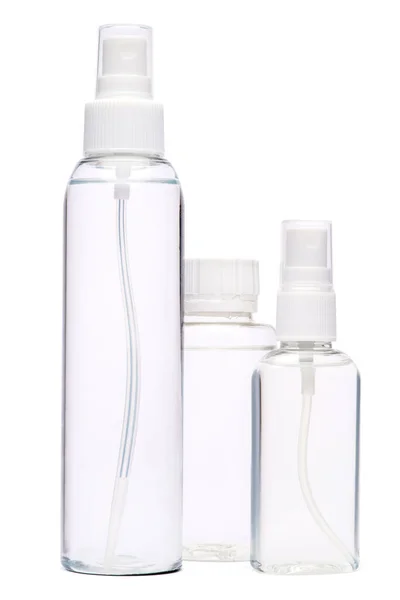 Grupo de mãos desinfetante spray garrafas isoladas em fundo branco — Fotografia de Stock