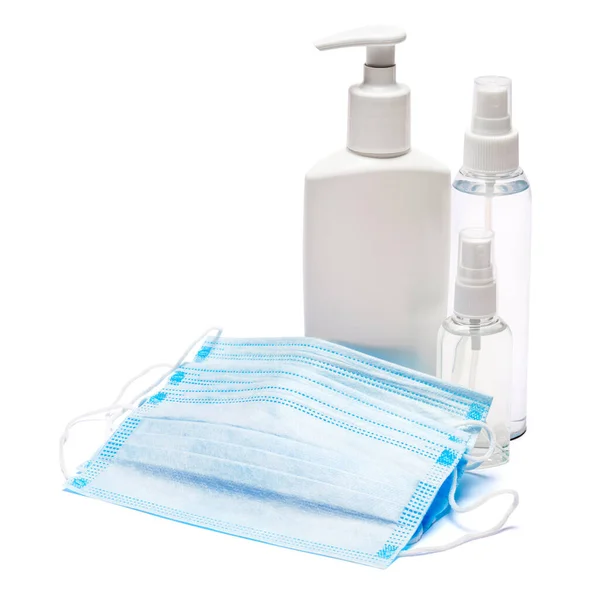 Flaska kräm, lotion, desinfektionsmedel eller flytande tvål och skyddsmask isolerad på vit bakgrund — Stockfoto