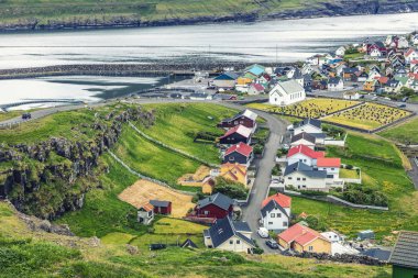 little colorful town in faroe islands clipart