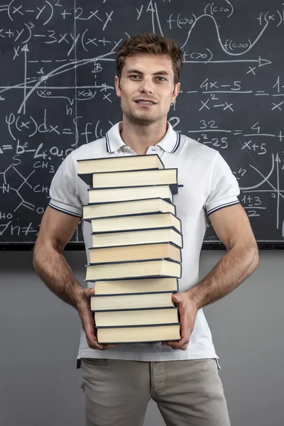 Jovem Professor Segurar Lotes Livros — Fotografia de Stock