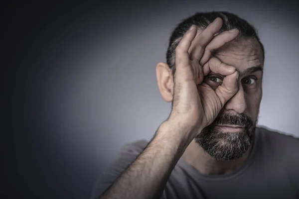 Man Look Throught Circle Made His Finger — Stock Photo, Image