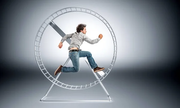 Man Running Huge Hamster Wheele — ストック写真