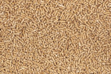 detail of natural wood pellets background clipart