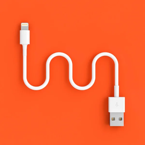 Serpentina en forma de cable USB sobre un fondo de color coral . —  Fotos de Stock