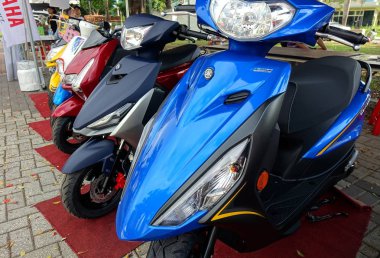 Kaohsiung, Tayvan--30 Haziran 2018: elektrik çevre dostu scooter vardır genel olay ekranda