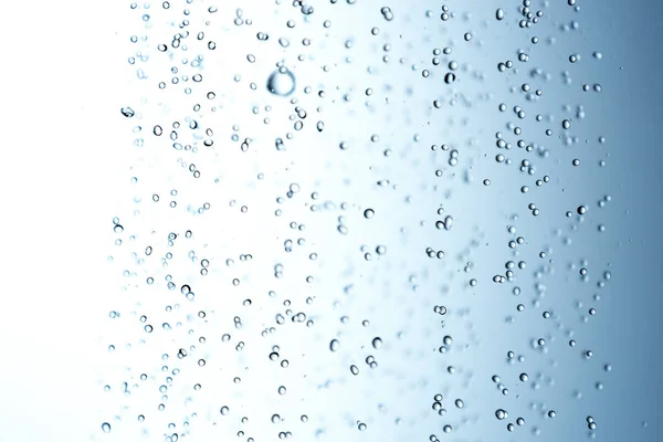 Vallende Water Druppels Blauwe Achtergrond — Stockfoto