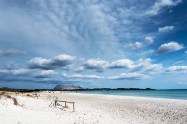 La Cinta beach next to San Todoro city in Sardinia, Italy. clipart