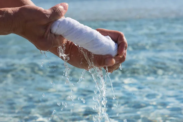 Hands Squeeze Wet Cloth — Stock Photo, Image